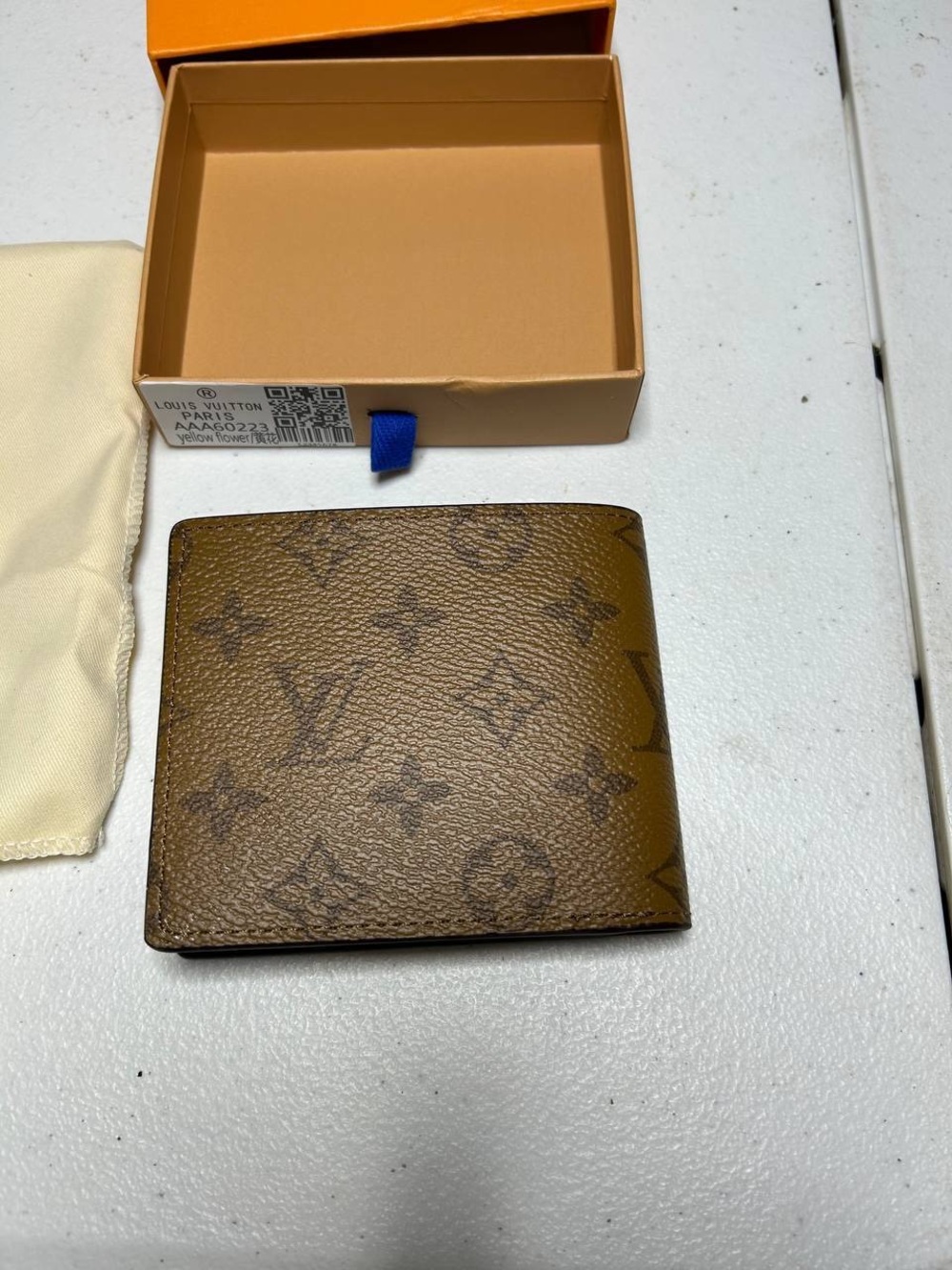 Louis Vuitton Monogram Canvas Wallet in Brown